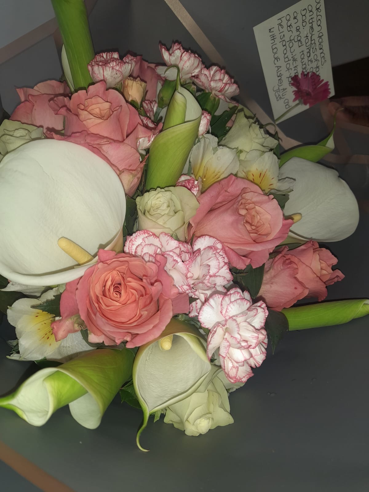 Bouquet of roses wrapped for delivery